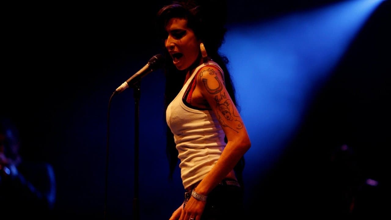 Amy Winehouse - Live at Les Eurockeennes de Belfortの背景画像
