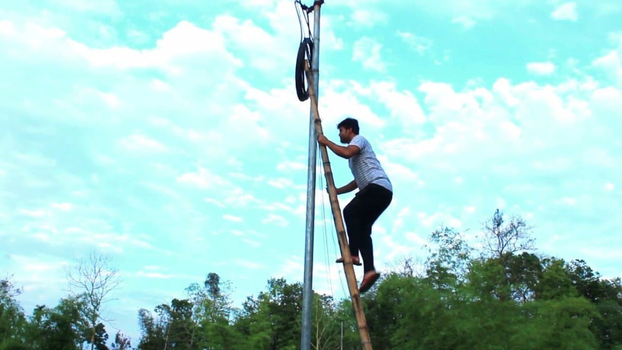 Jibon Onek Damiの背景画像