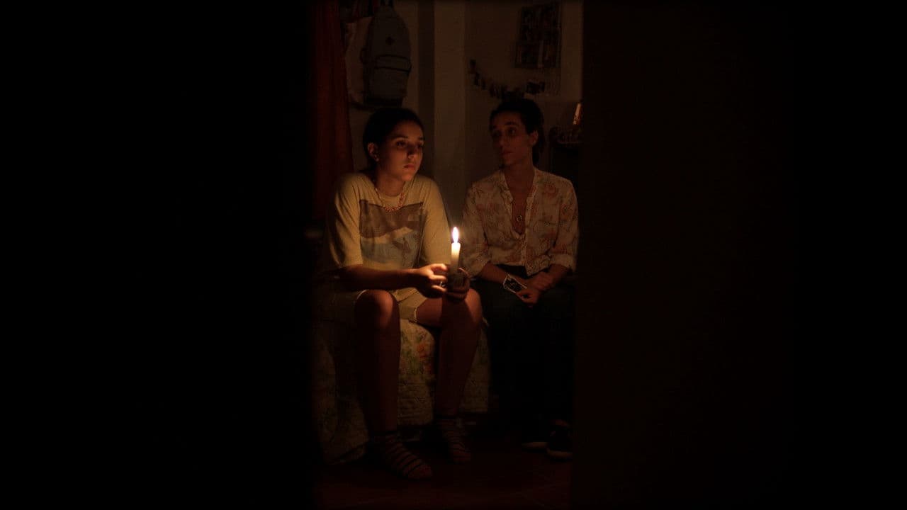 Canciones que cantamos en la oscuridadの背景画像