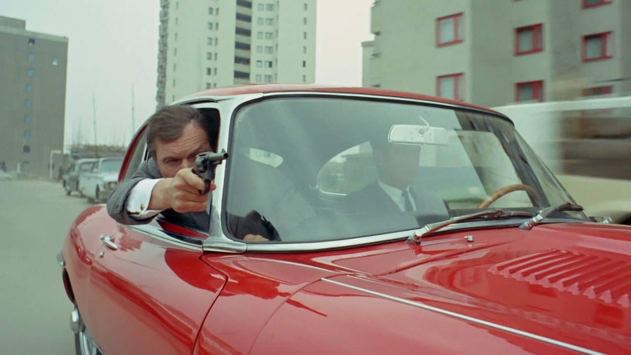 Jerry Cotton - Der Tod im roten Jaguarの背景画像
