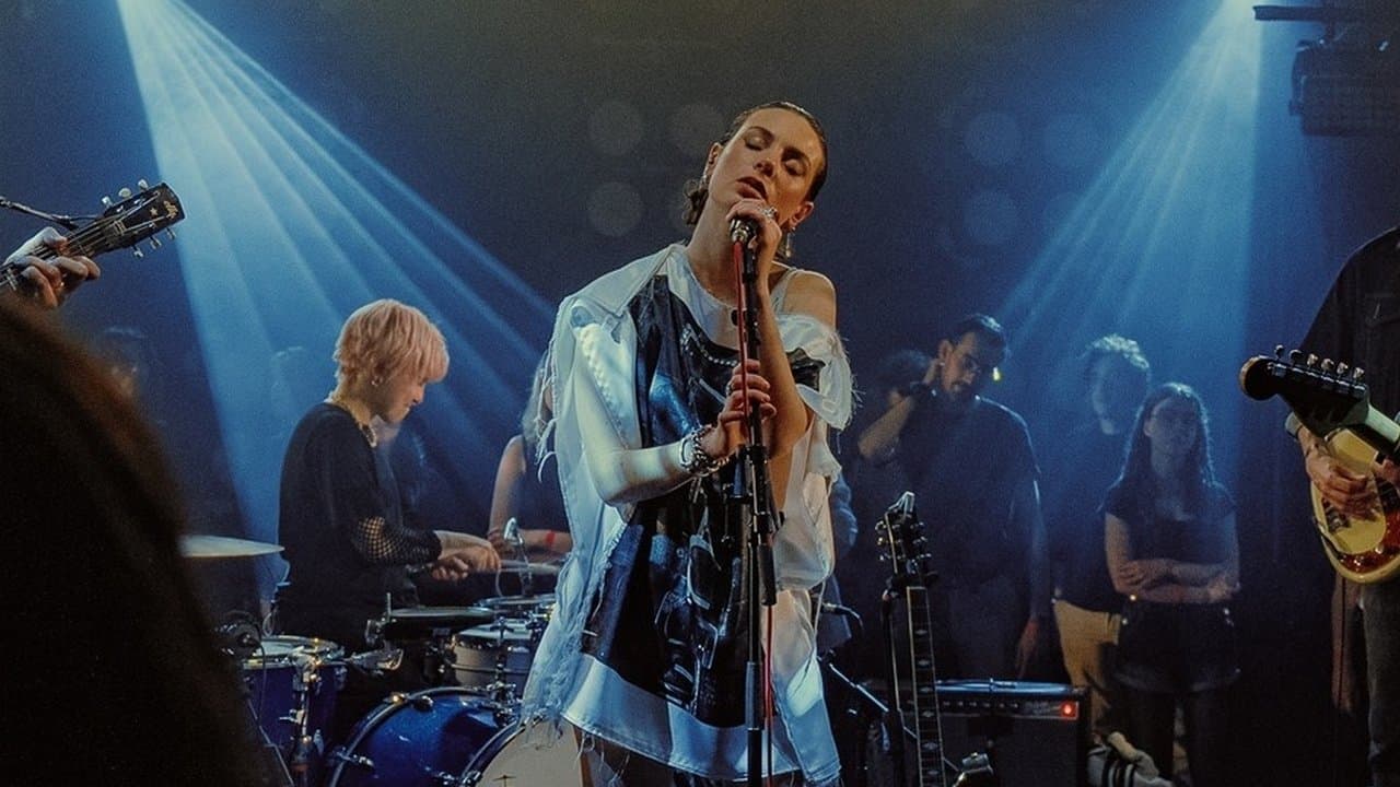 Adé en concert à la Flèche d'Orの背景画像