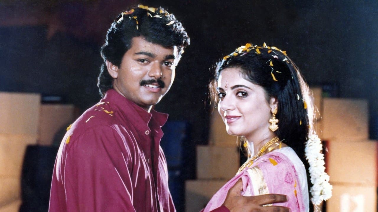 Kaalamellam Kaathiruppenの背景画像