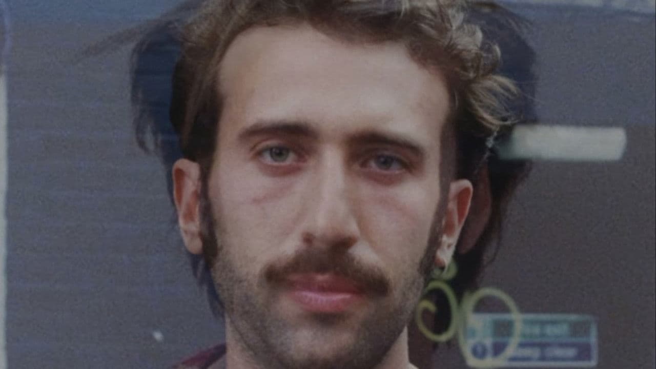 I Look Like Nicolas Cageの背景画像