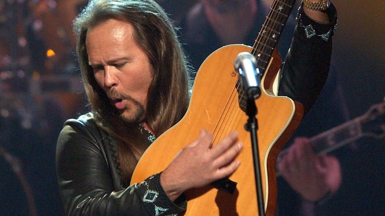 Travis Tritt - Live and Kickin'の背景画像