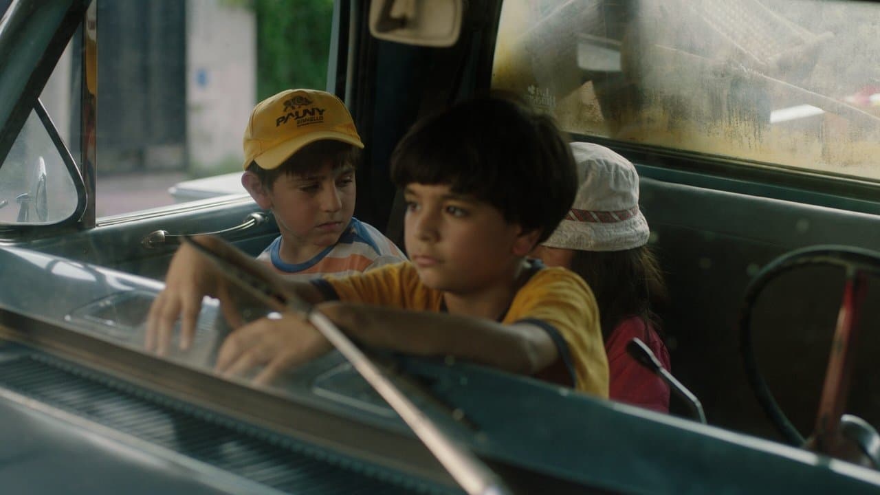 Una casa con dos perrosの背景画像