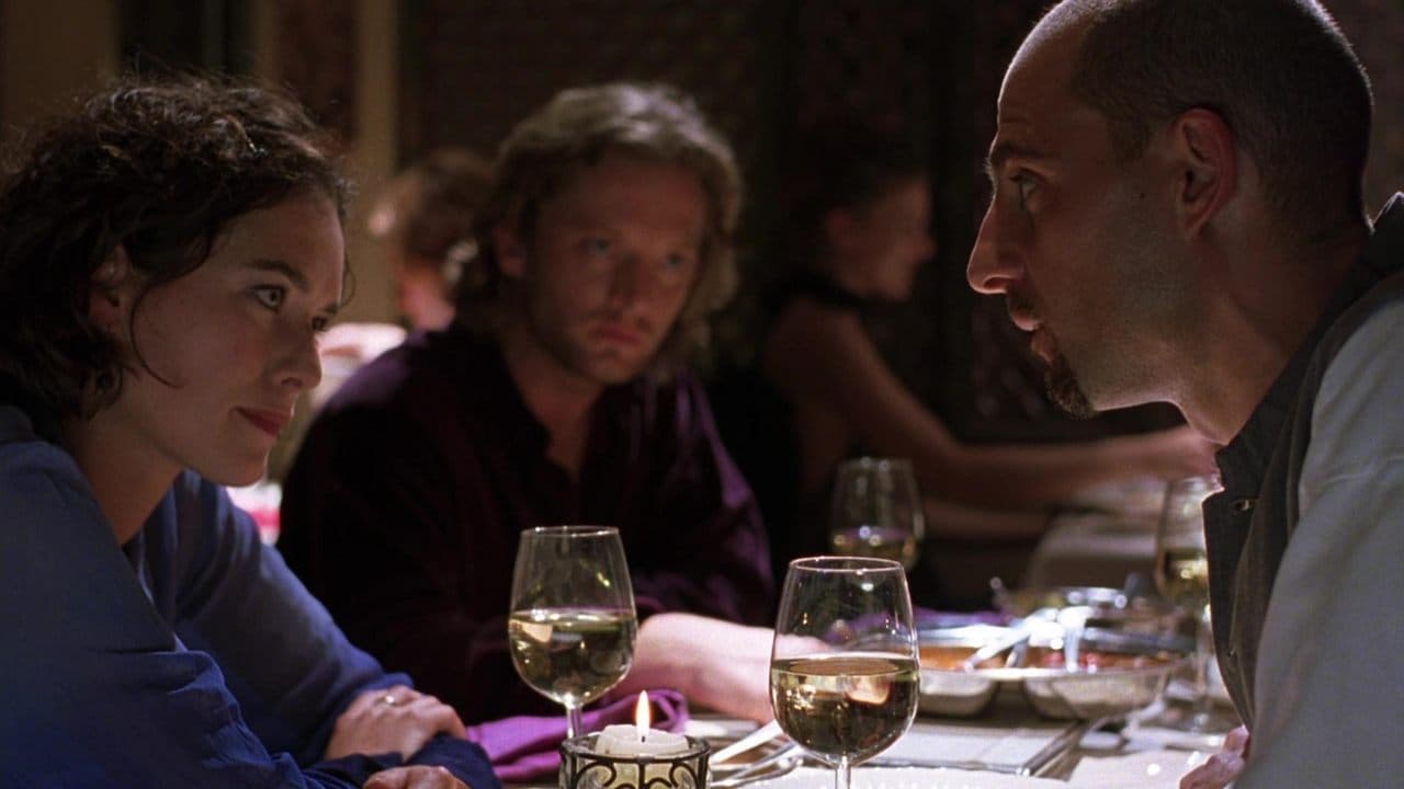 The Man with Rain in His Shoesの背景画像