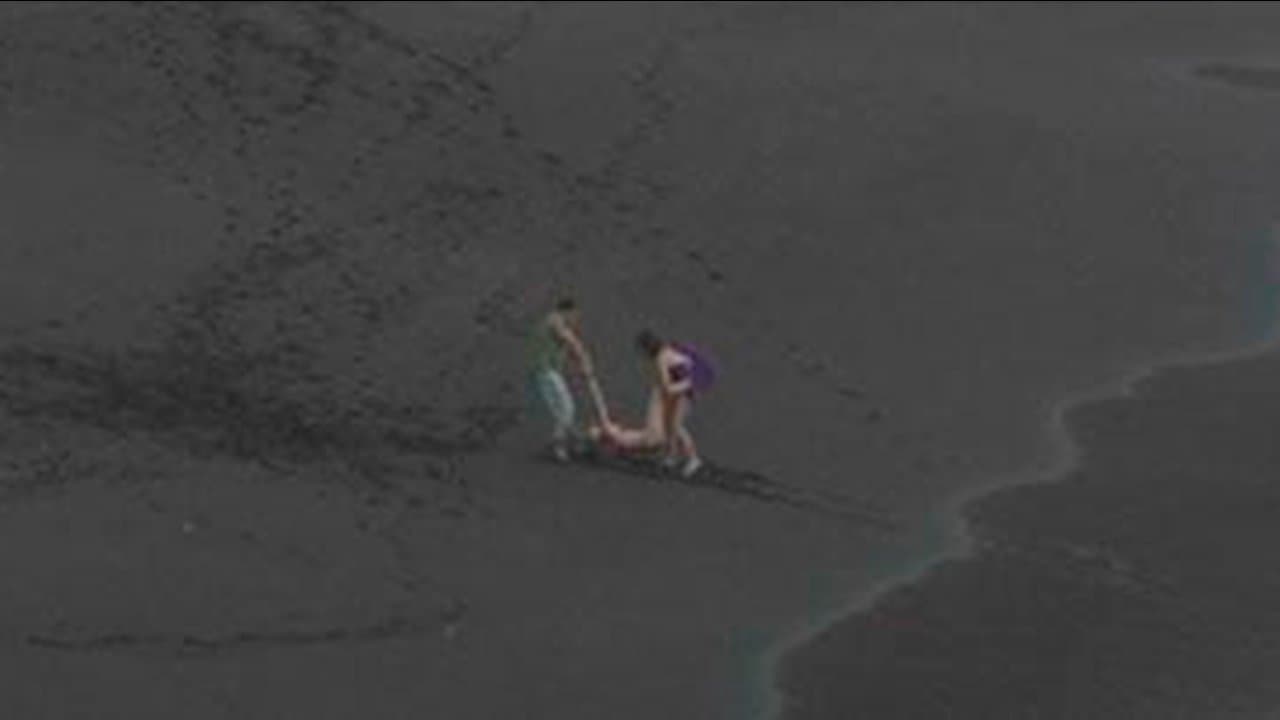 Tres en playaの背景画像