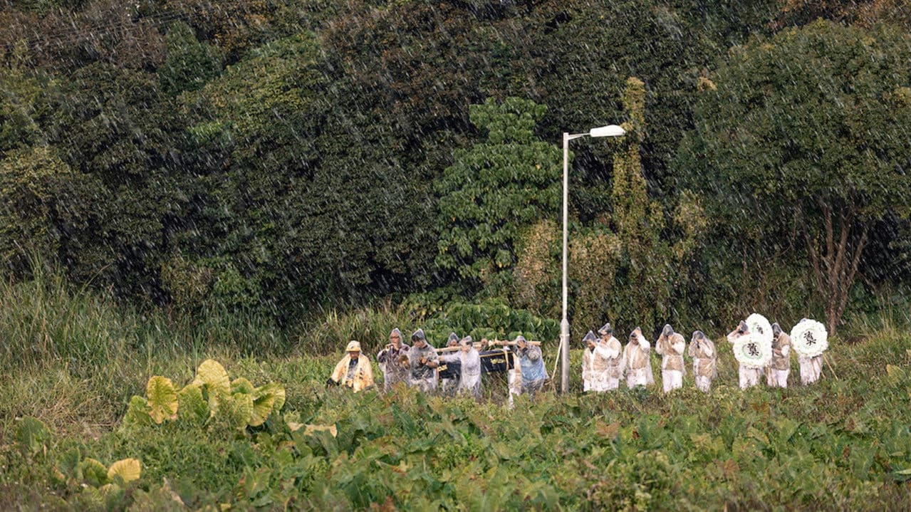 風雨中人の背景画像