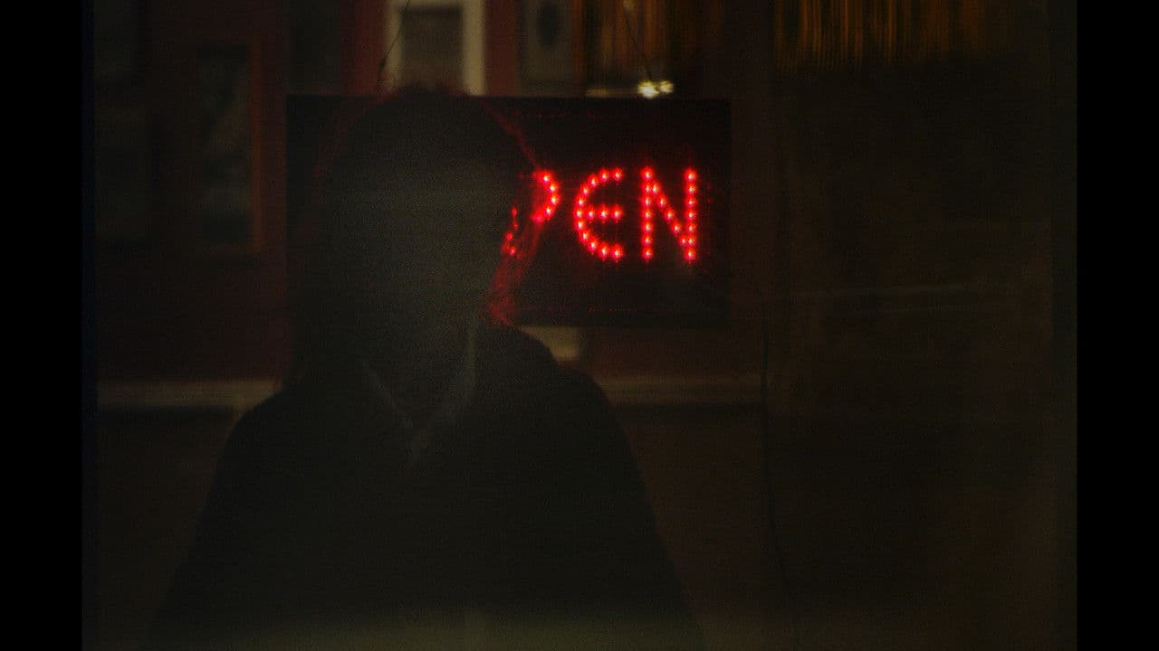 A Sad, Sad Ghost Picking at the Hairs of Their Knucklesの背景画像